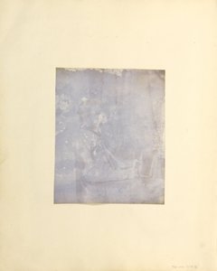 Profile Portrait of a Seated Man Holding a Book